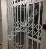 Раздвижная решетка "Стандарт Усиленные ромбы"  - Сварог - изготовление раздвижных, распашных, сварных кованых решеток на окна и двери, а так же  сварные, металлические распашные ворота и забор под ключ